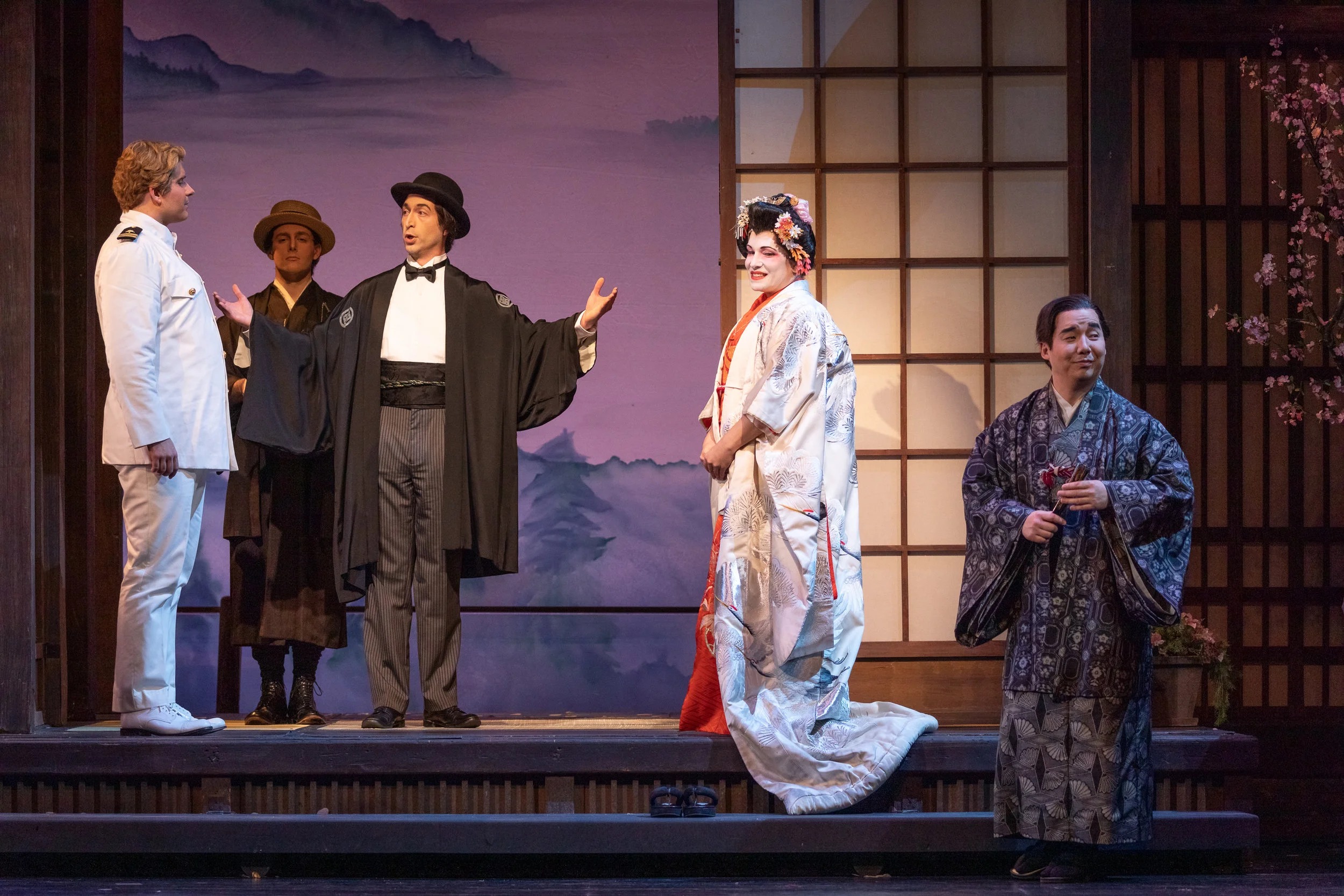 Matthew Vickers as Pinkerton, Joseph Hubbard as the Imperial Commissioner performing the ceremony, Danielle Pastin as Cio-Cio-San, and Julius Ahn as Goro, the marraige broker. Photo by Ben Schill Photography; courtesy of Virginia Opera.