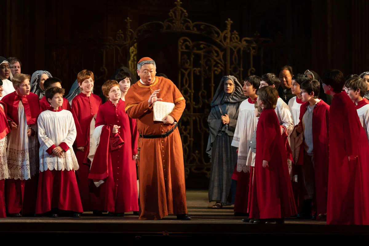 Wei Wu as Sancristan and the Children’s Chorus. Photo by Scott Suchman; courtesy of Washington National Opera.
