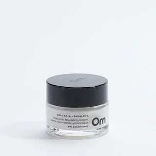 Gotu Kola + Squalane Hyaluronic Nourishing Cream in a clear container with a black lid