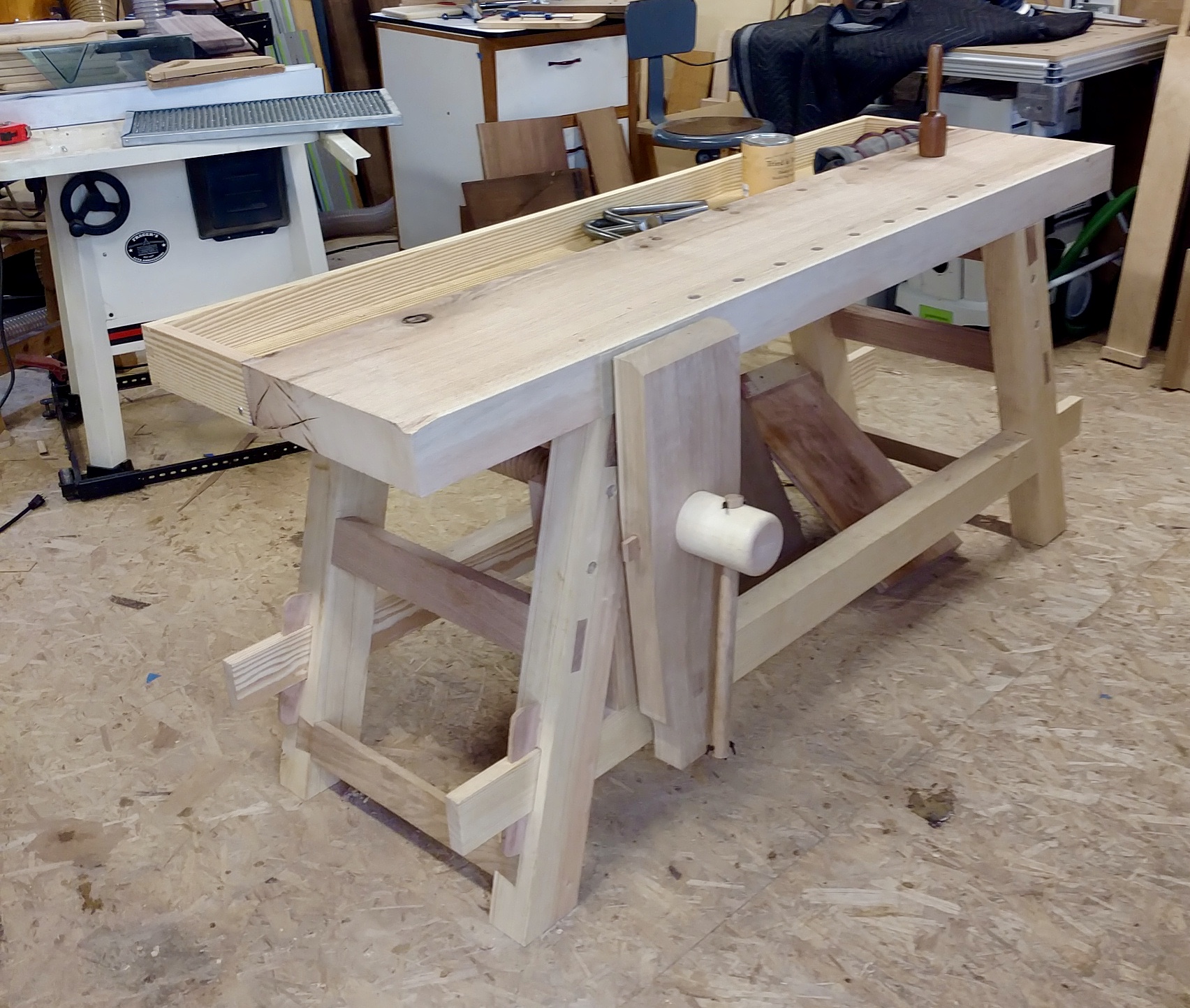 Here's a photo of my bench, in my shop, just before I put on a coat of oil.