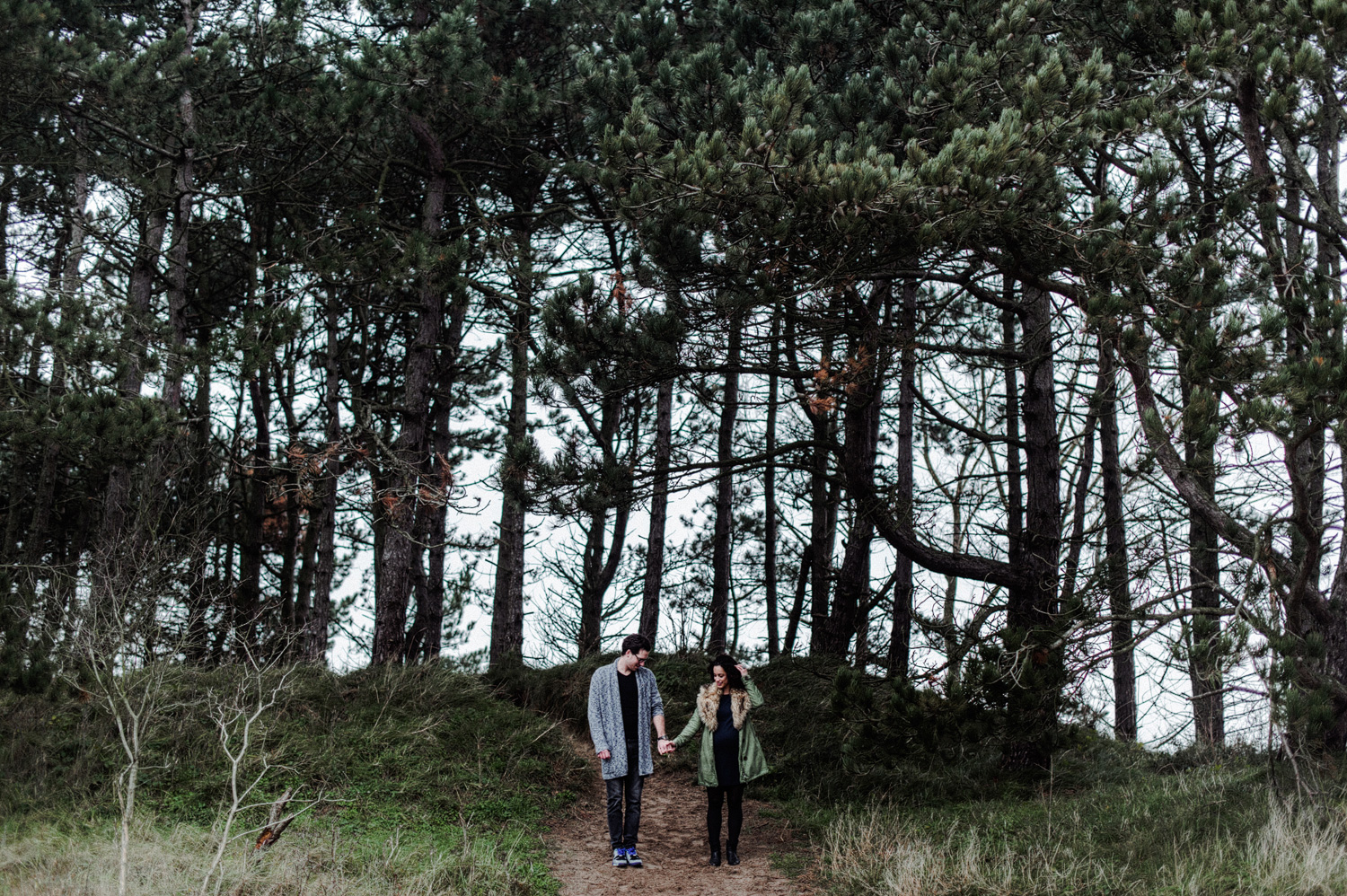 Couple facing camera