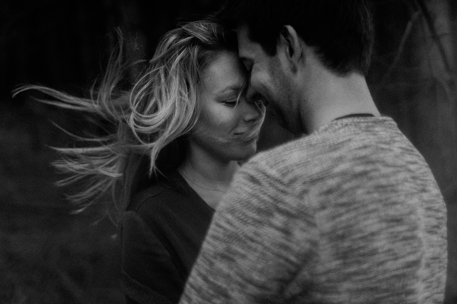Portrait of couple together with wind in hair
