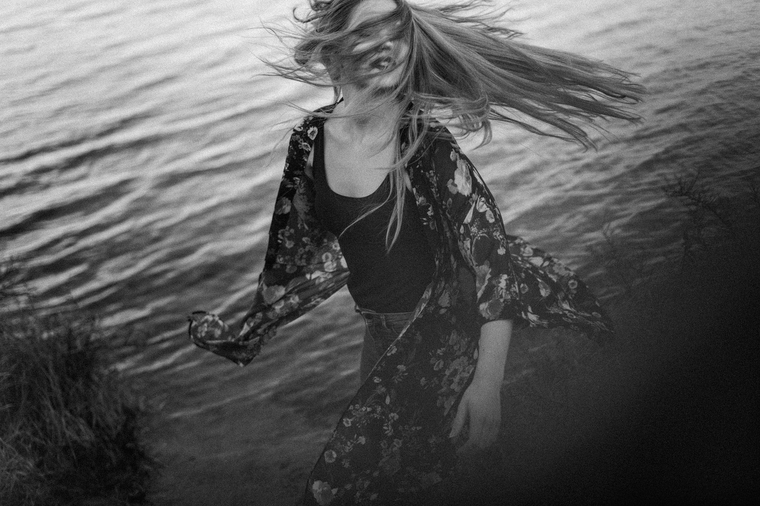 Fine art close up portrait of girl face covered with hair