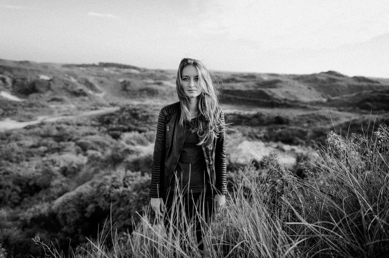 Fine art portrait of girl in dunes