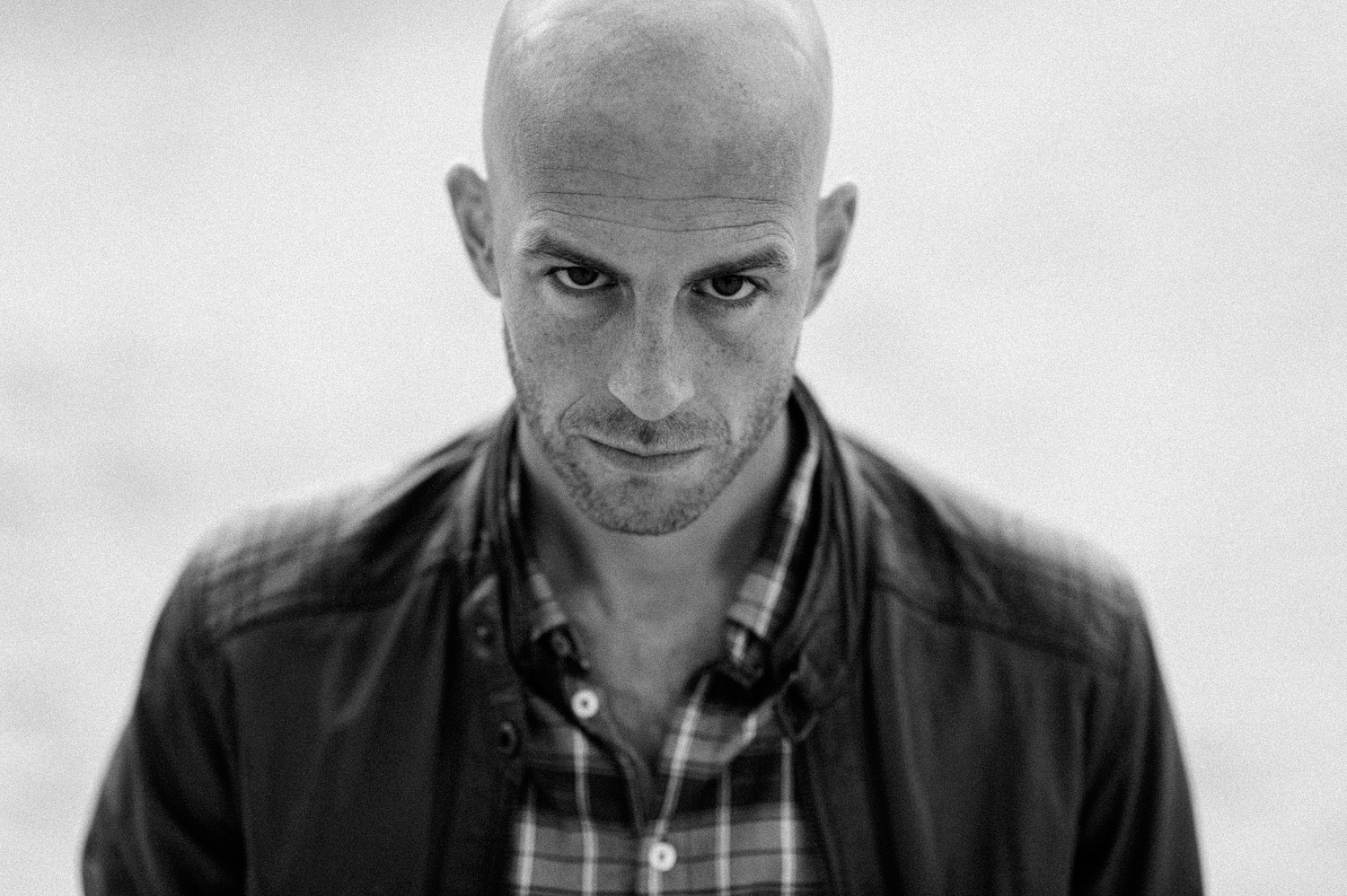 Close up portrait of bald guy