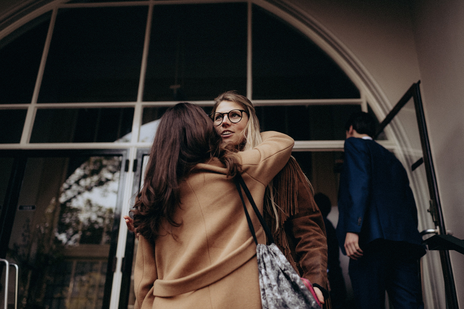 Weddings guests hugging