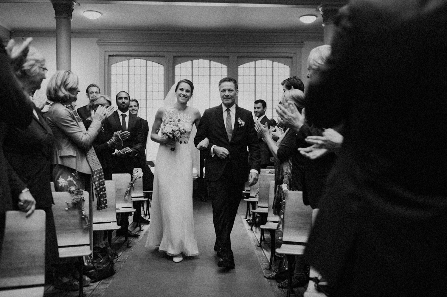 Bride walking down the aisle at Keizersgracht Kerk Amsterdam