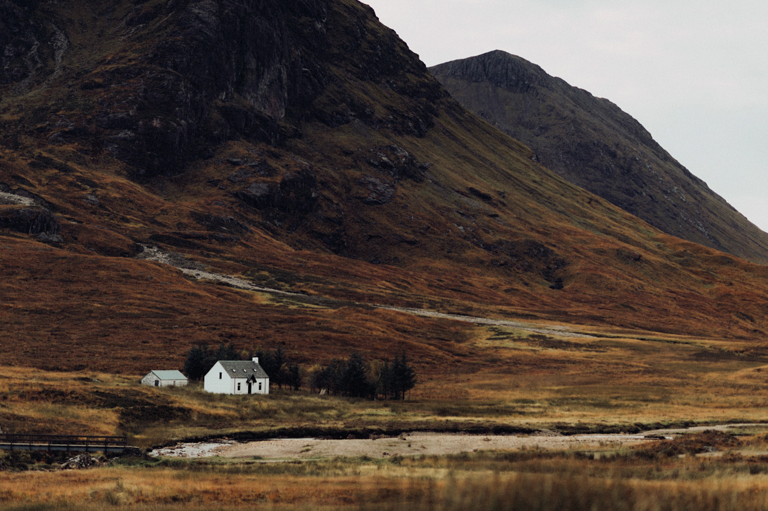 White Cottage at River Coupall Valley in Scotland