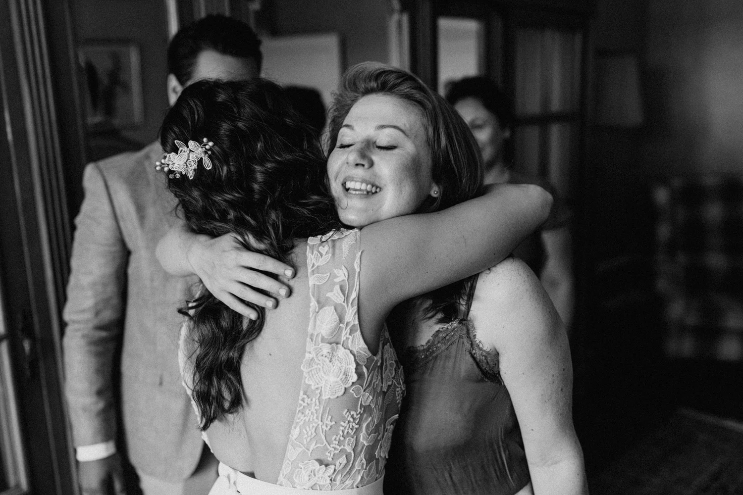 Bride hugging good friend