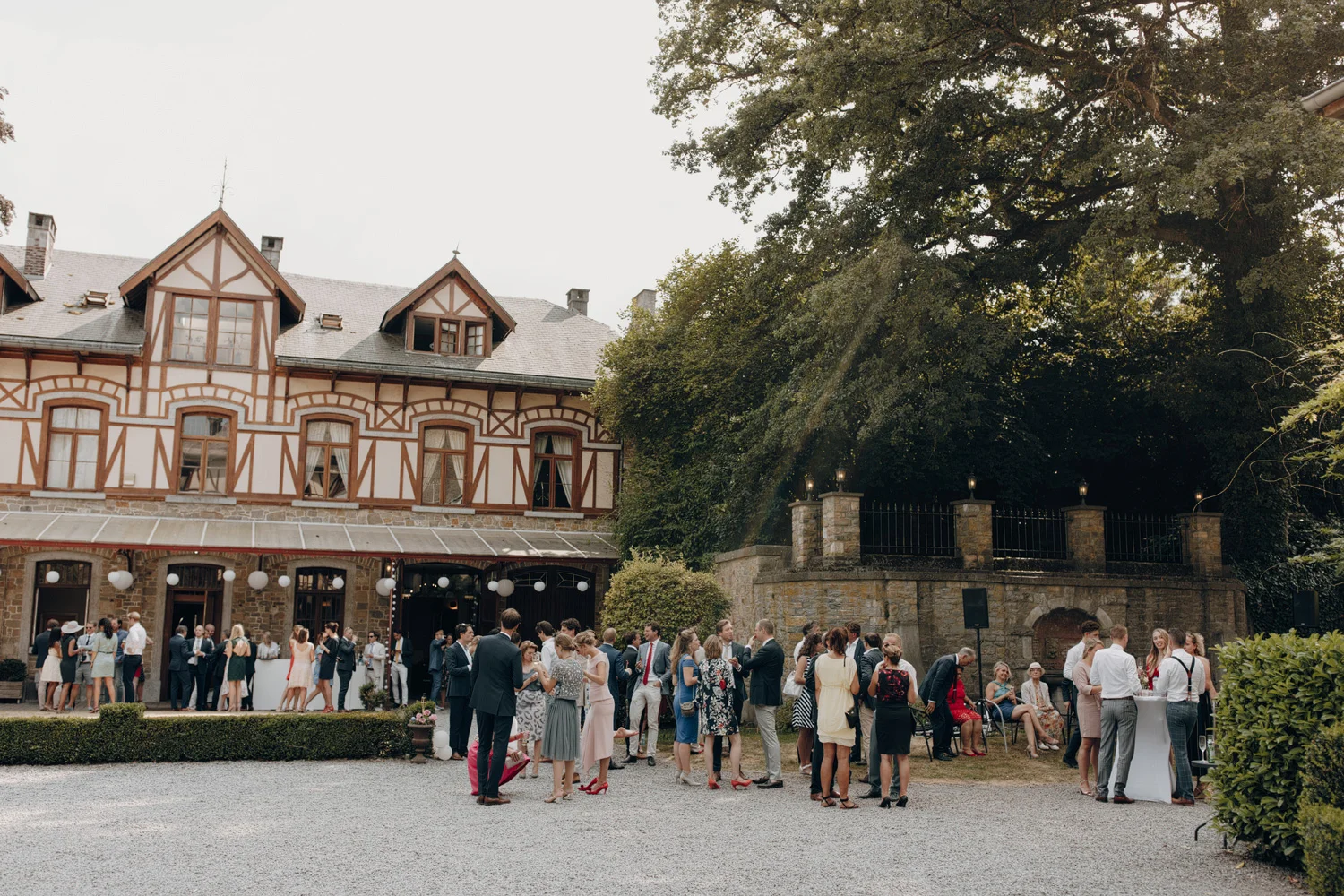 People socializing at Chateau de Presseux