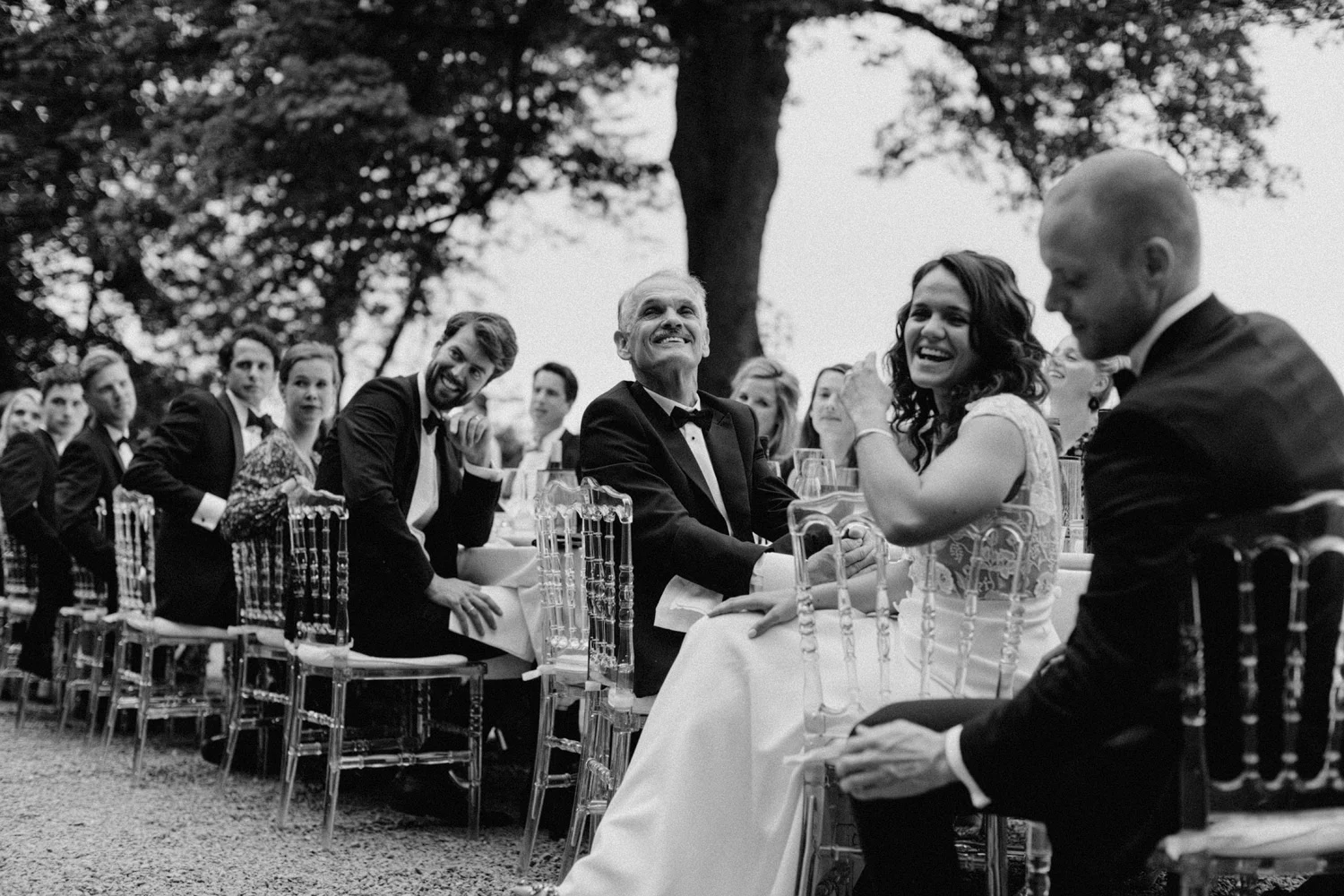 Bride laughing during speech at Chateau de Presseux