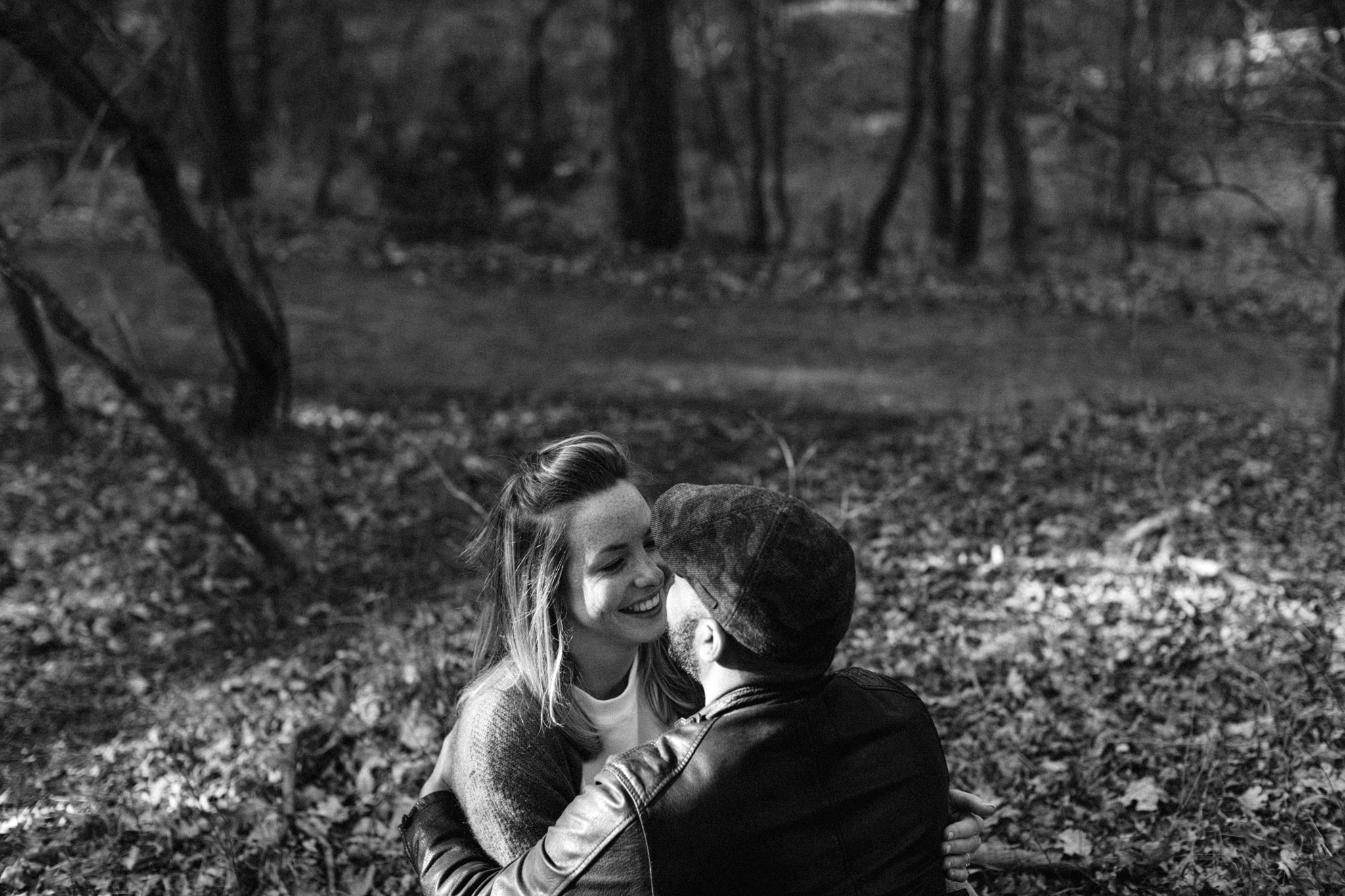 Couple sitting together in the sun in Kennemerduinen