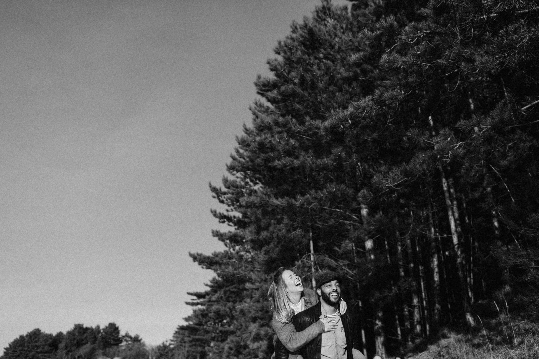 Couple joking around at sunny day