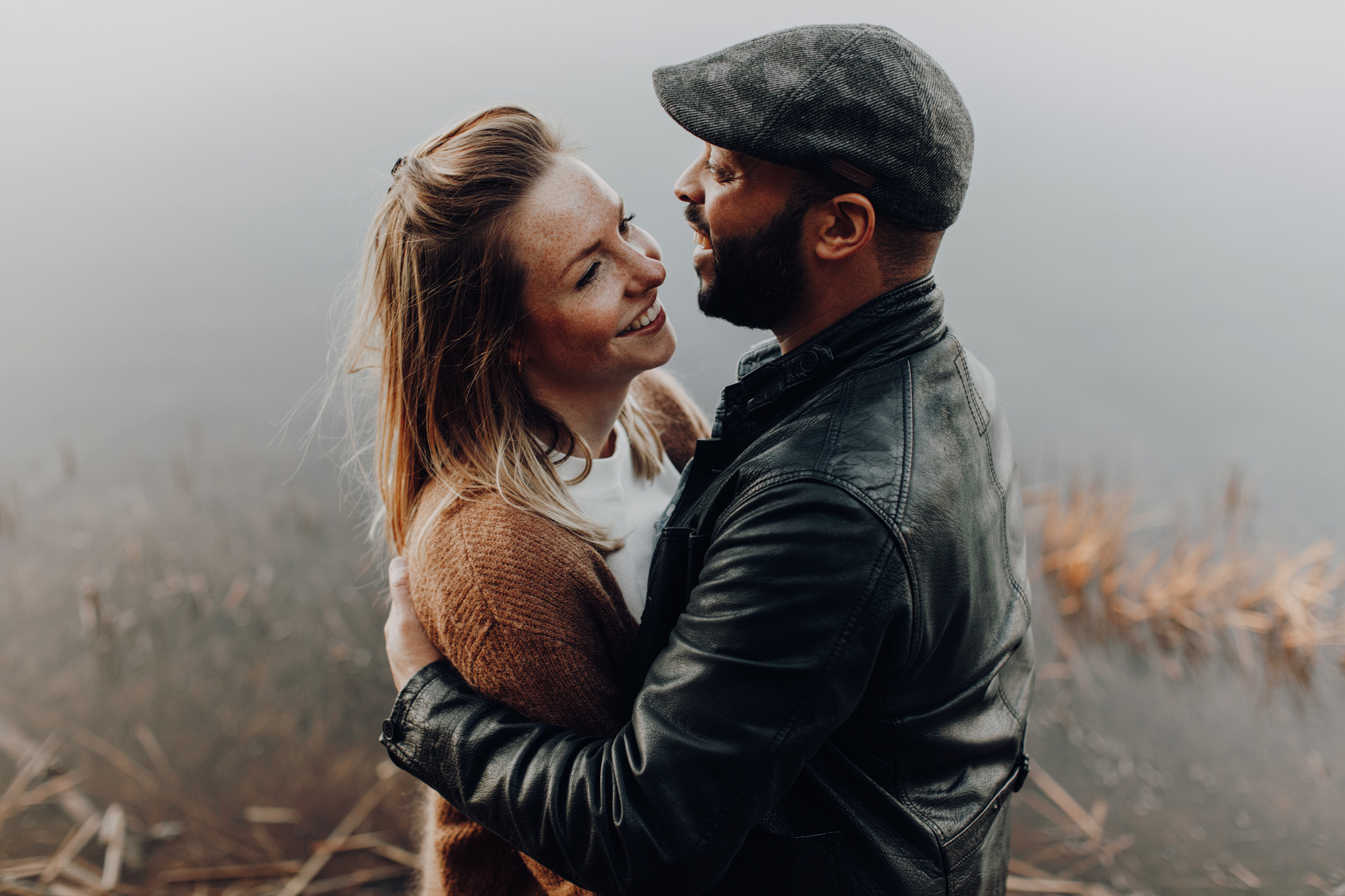 Couple facing each other and smiling