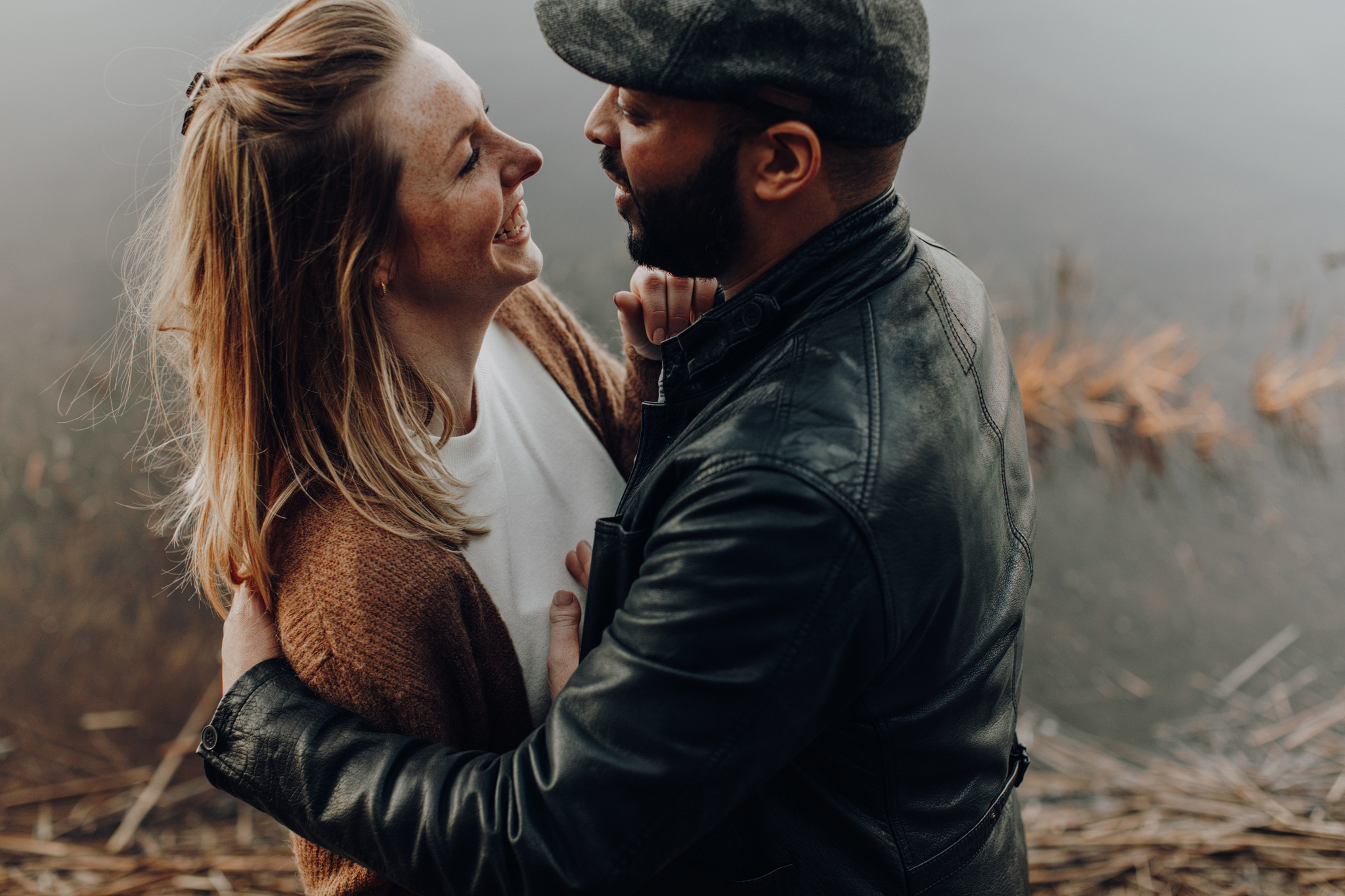 Couple facing each other and smiling