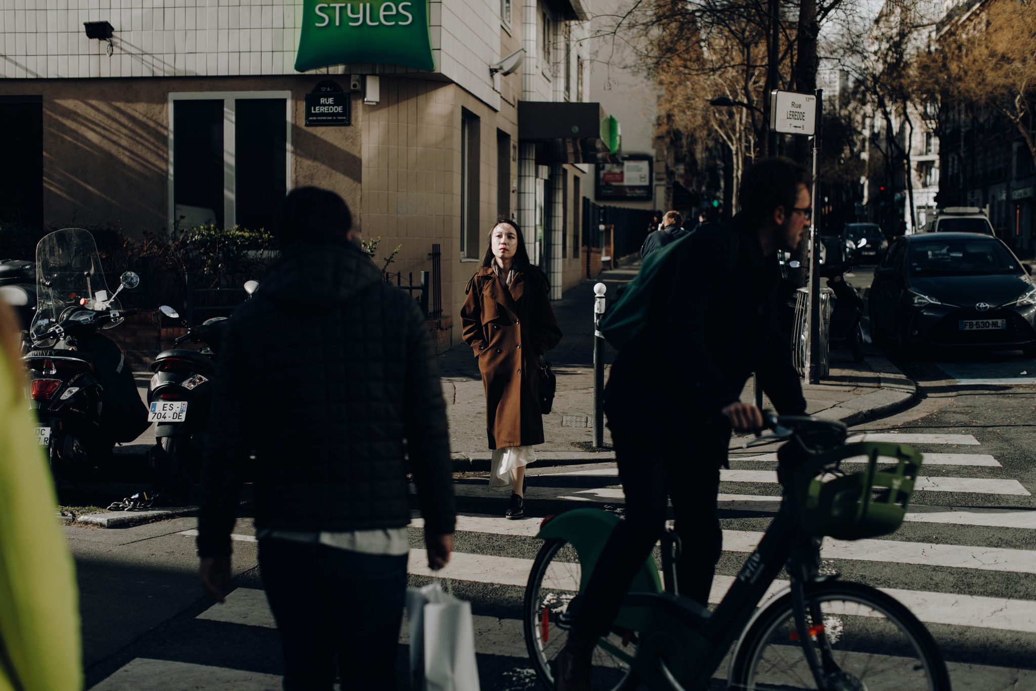 Girl walking in the light in Paris, France