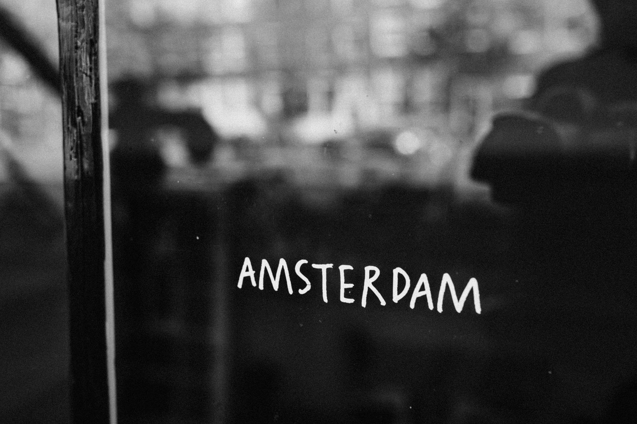Amsterdam sign written on window