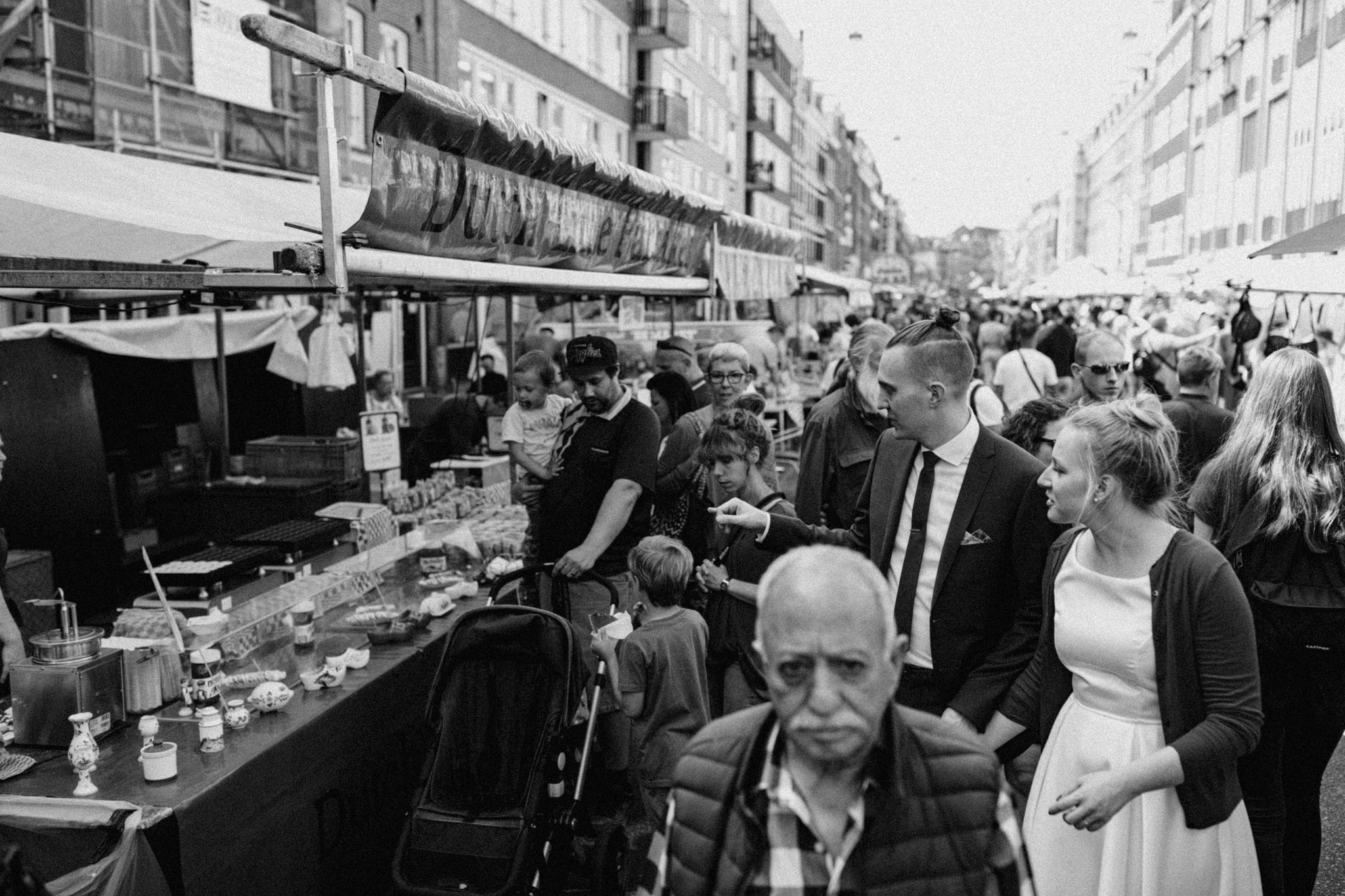 Elopement couple smiling at Albert Cuyp market