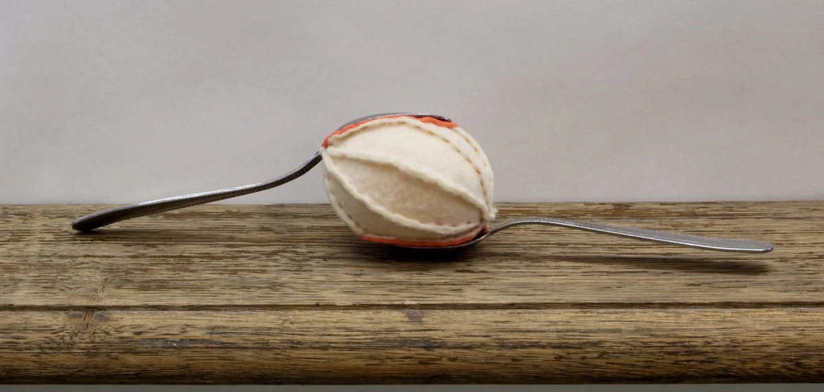 Spoon and egg and spoon