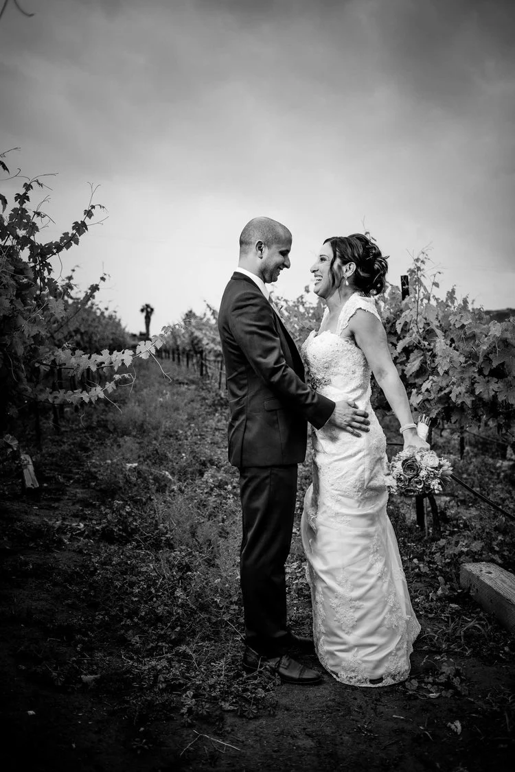 Black and white wedding photo at a vineyard