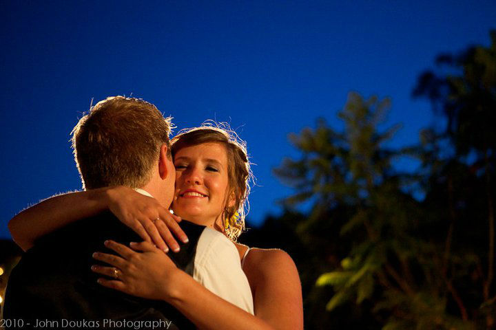 Bride and groom hugging