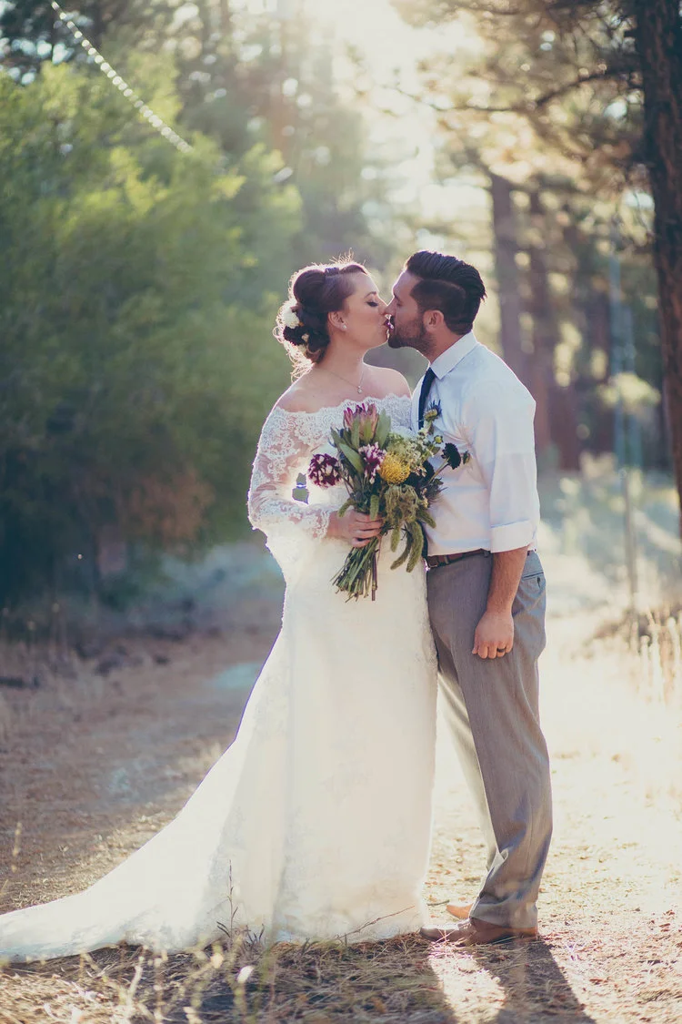 bride and groom kissing