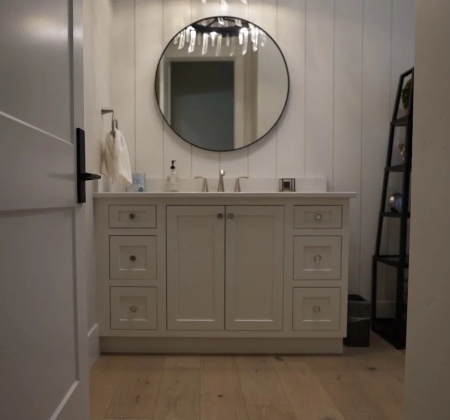 Dark furniture style powder bath vanity