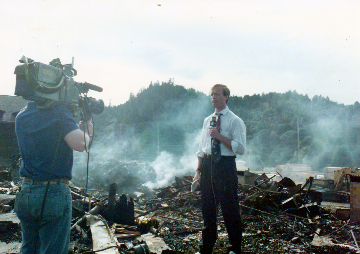 Reporting at the scene of a devastating fire in Scotia, California