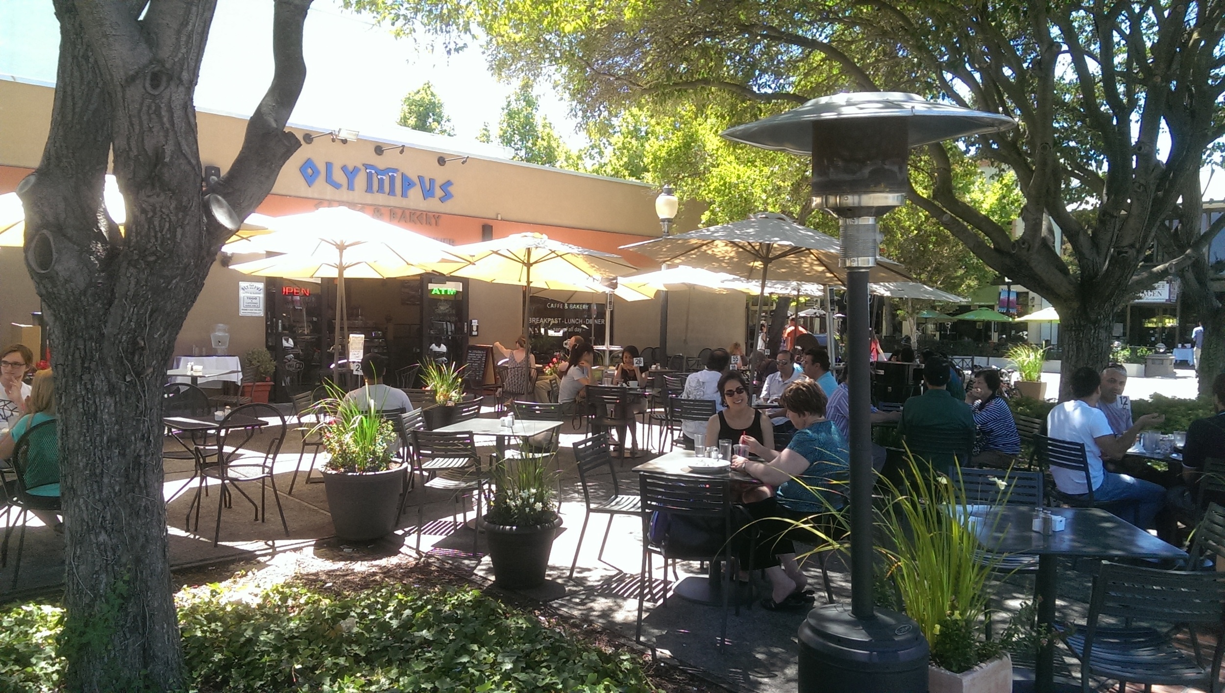 The patio at the Olympus Cafe, just across the street from Mountain View's train station, one of many reasons my town should be more than a "transfer point" for Super Bowl 50 fans.