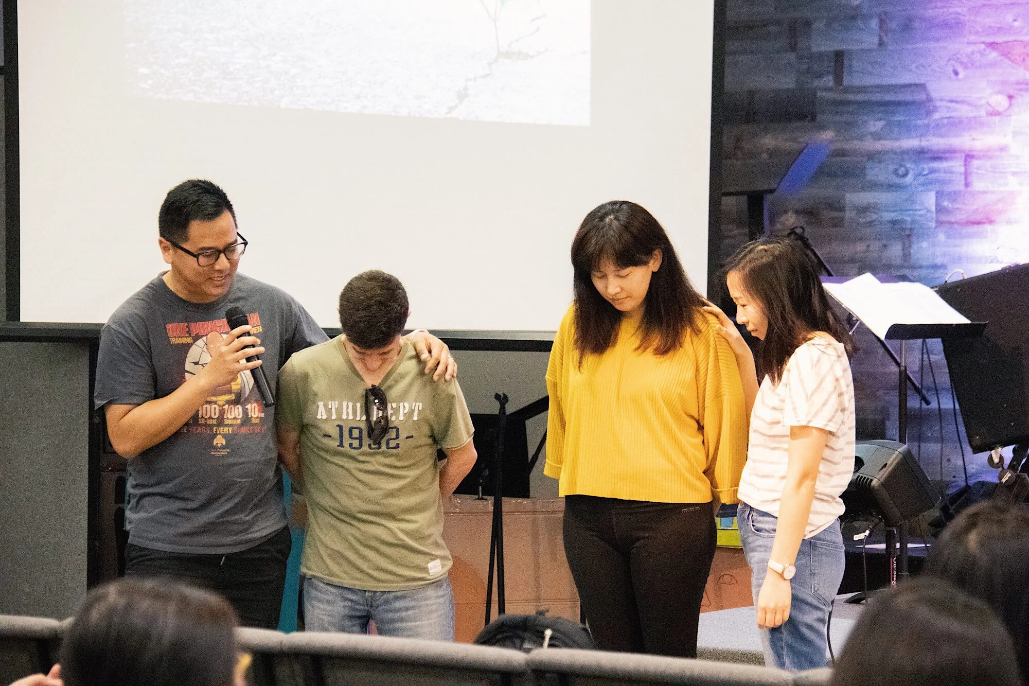 Steve and Maggie praying for Troy and Abigail during send off.