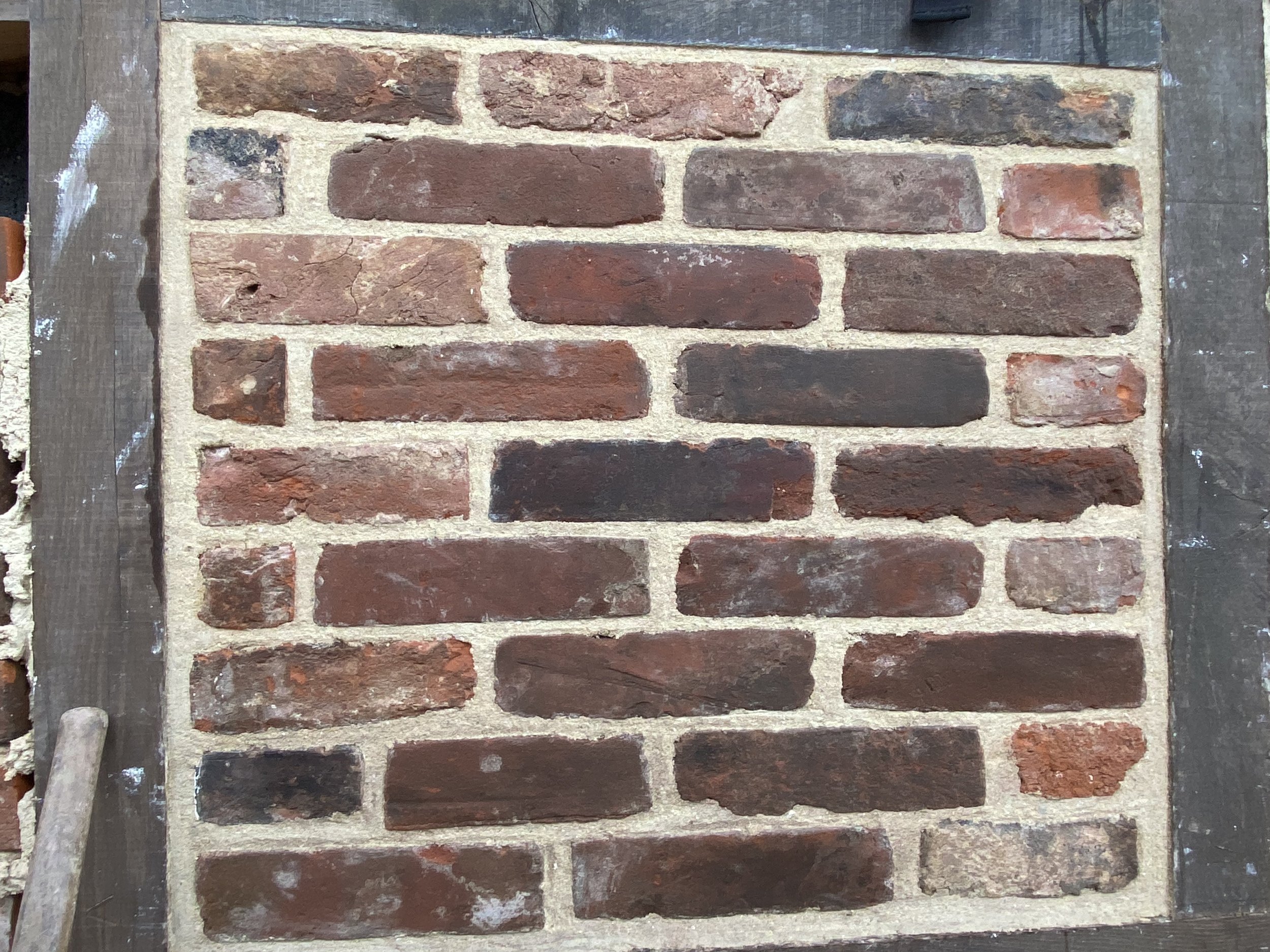 Finished brick panel infill
