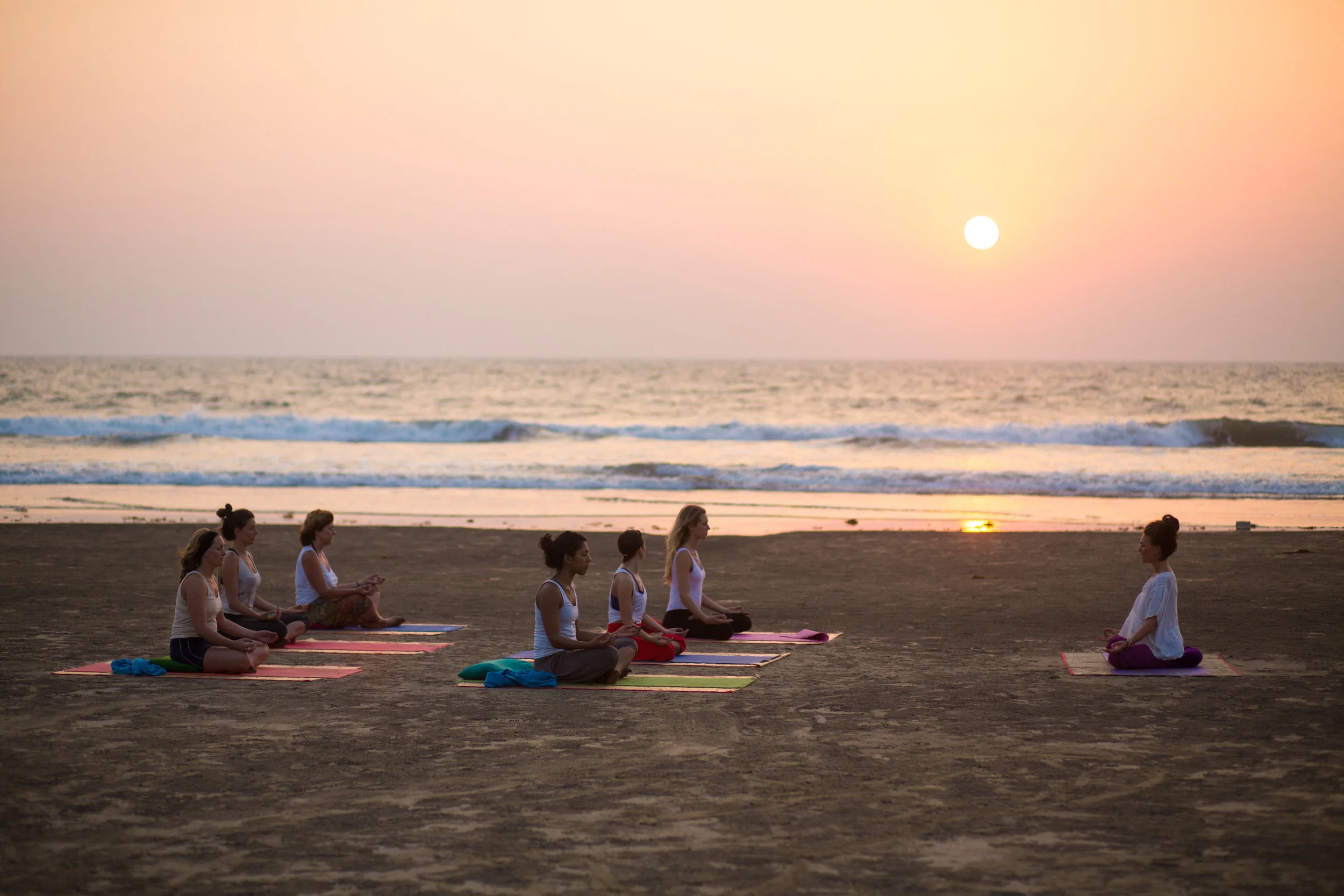 Sunset yoga on Ashwem beach