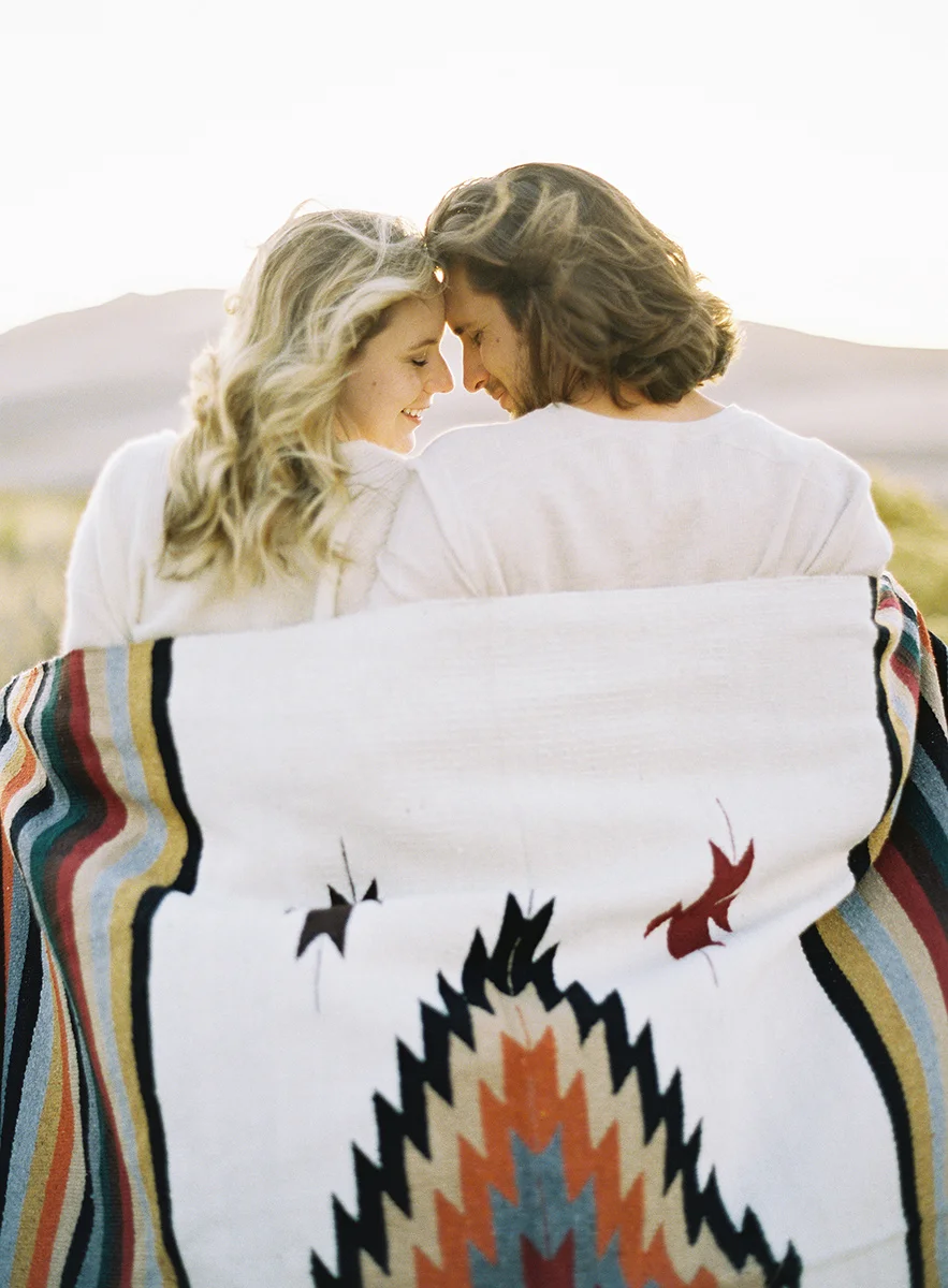 romantic couple with blanket in colorado on film