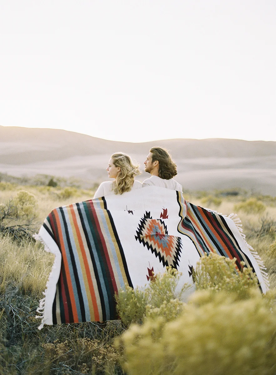romantic couple with blanket in colorado on film