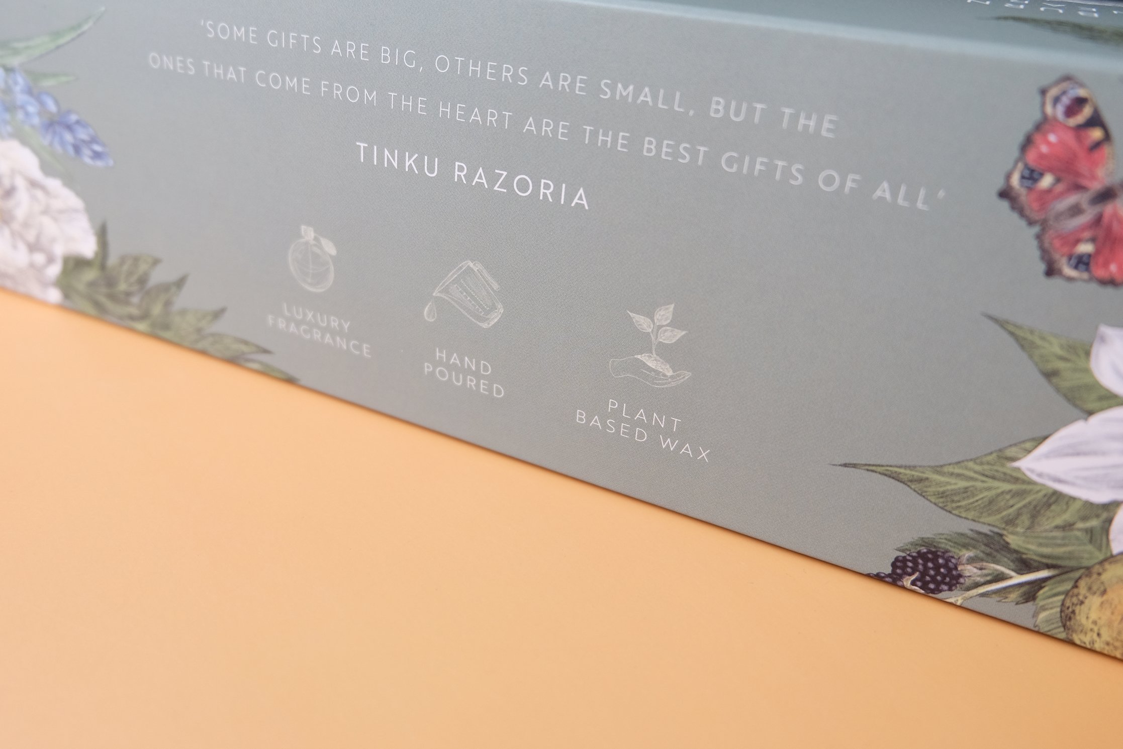 Back of the Glass & Wick Burner and wax melt unearthing collection gift box, featuring icon illustrations