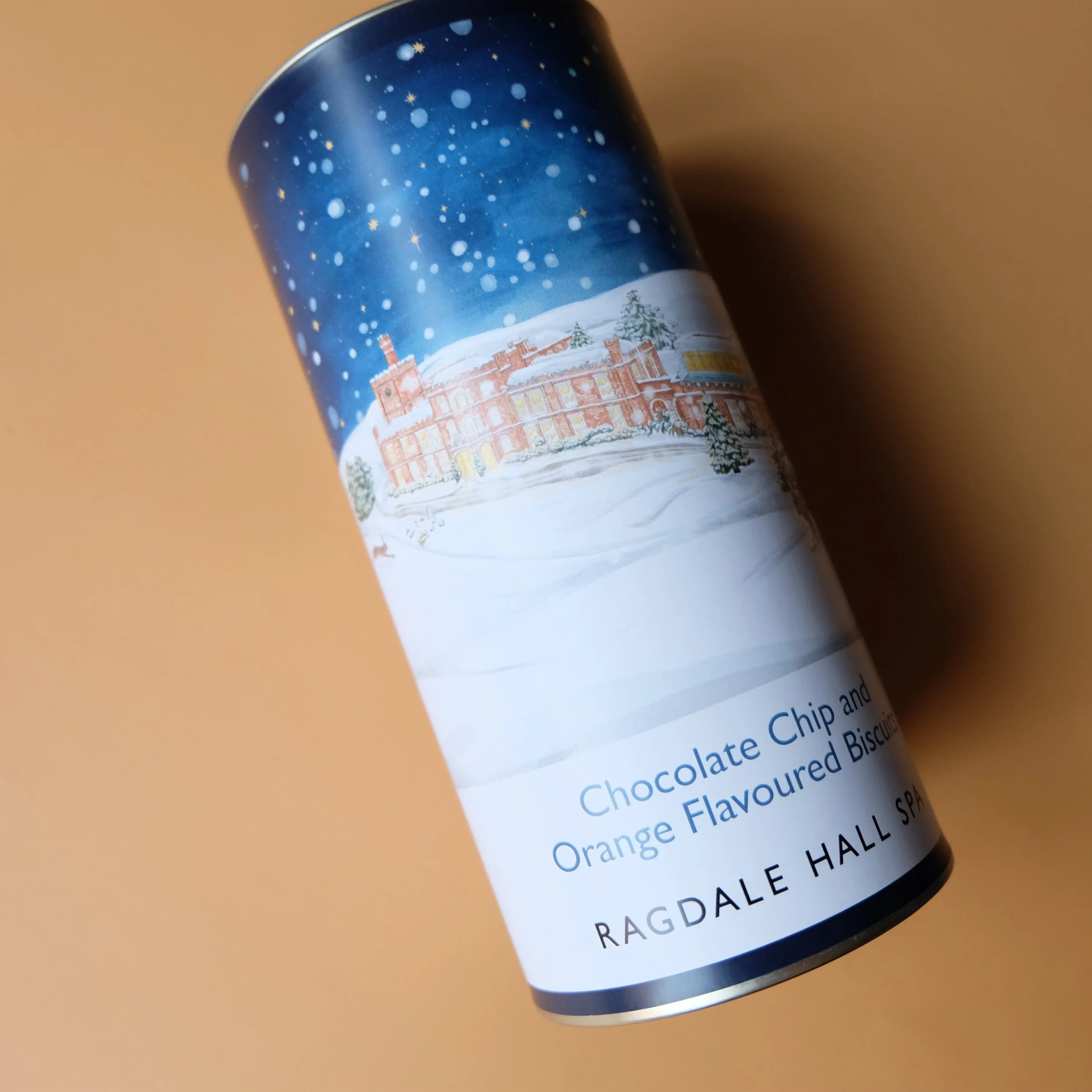 The promotional Christmas illustration was used for a variety of products, including a biscuit tin