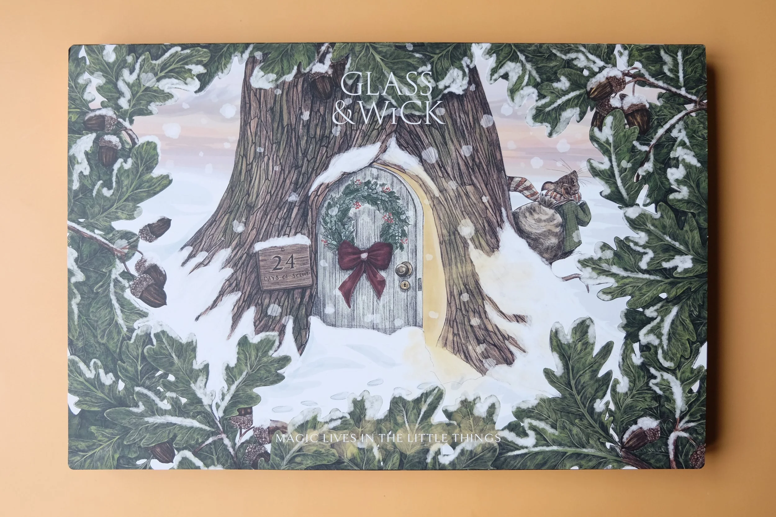 Front cover of the Glass & Wick advent calendar 2025