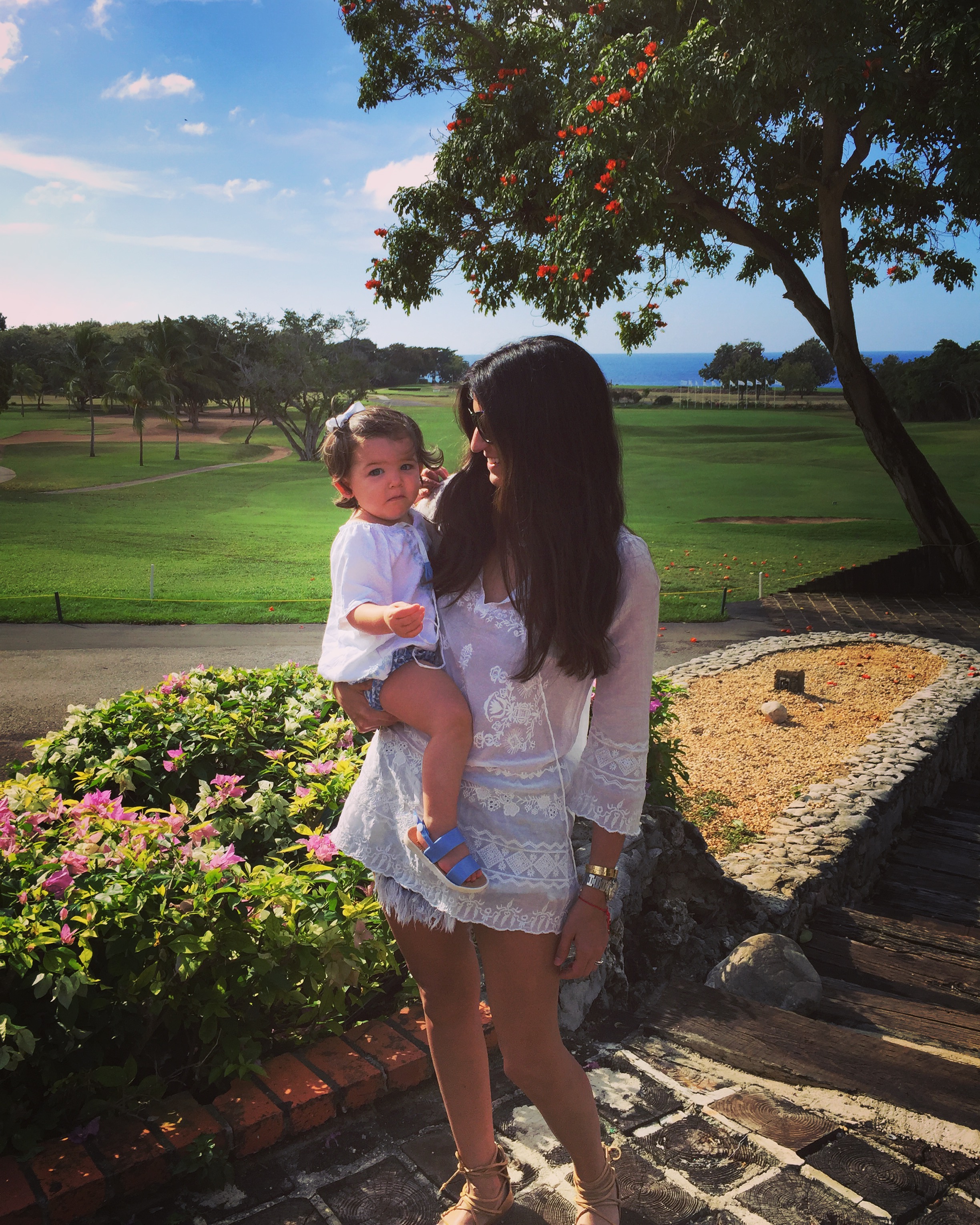 My mini after enjoying breakfast at the Lago Grill (our favorite spot with the best views!) The mini is wearing an adorable outfit from her Aunt to be from Rapunzel's Closet in Palm Beach.