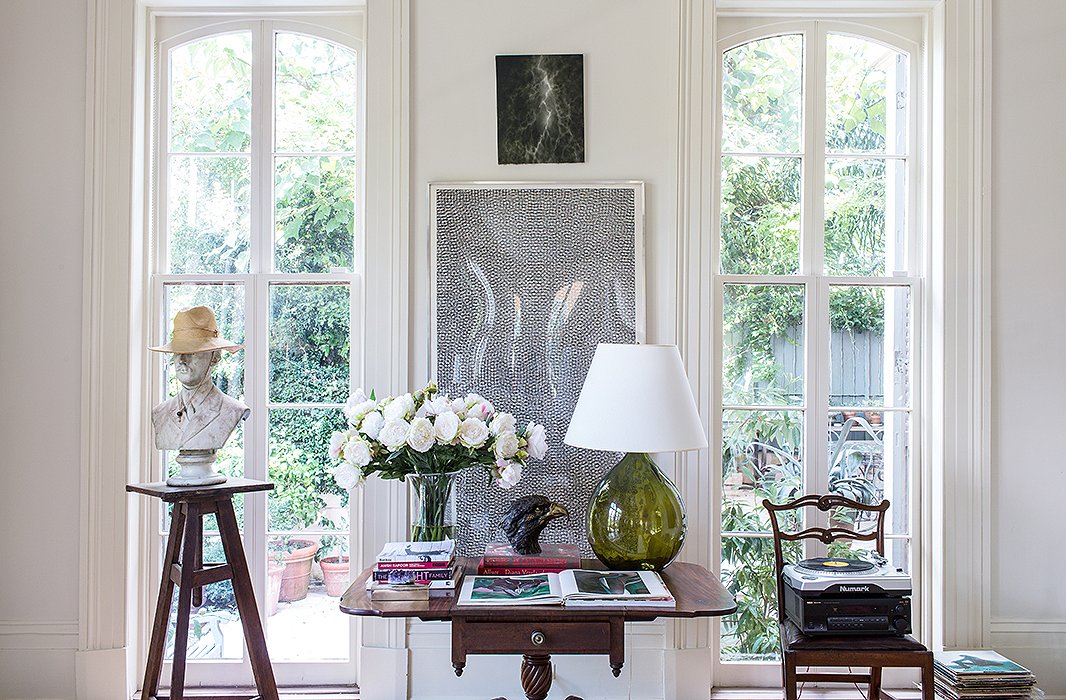 The sculpture stand holding the bust “was the first thing I bought in my life that cost something. It’s so impractical, and yet it’s been one of the great surprising moments in every room I’ve ever had.”