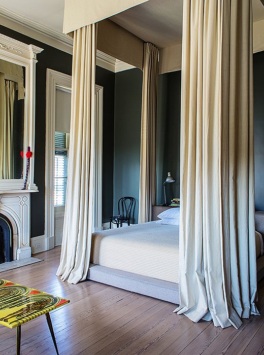 Maximalist in their sweep (“it’s super Game of Thrones, isn’t it?” says Sara) but minimalist in form (they feature no swags or trims) the beige linen canopy curtains in the master attach to the ceiling. “If everything is low, you feel like you’re lost in space.”