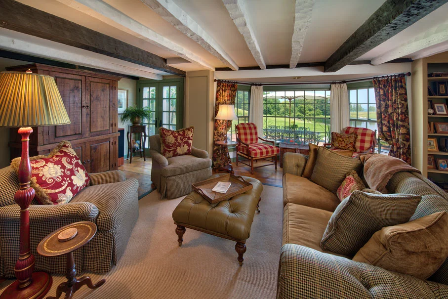 We added some additional vintage pieces and kept the floors simple with natural sisal rugs.