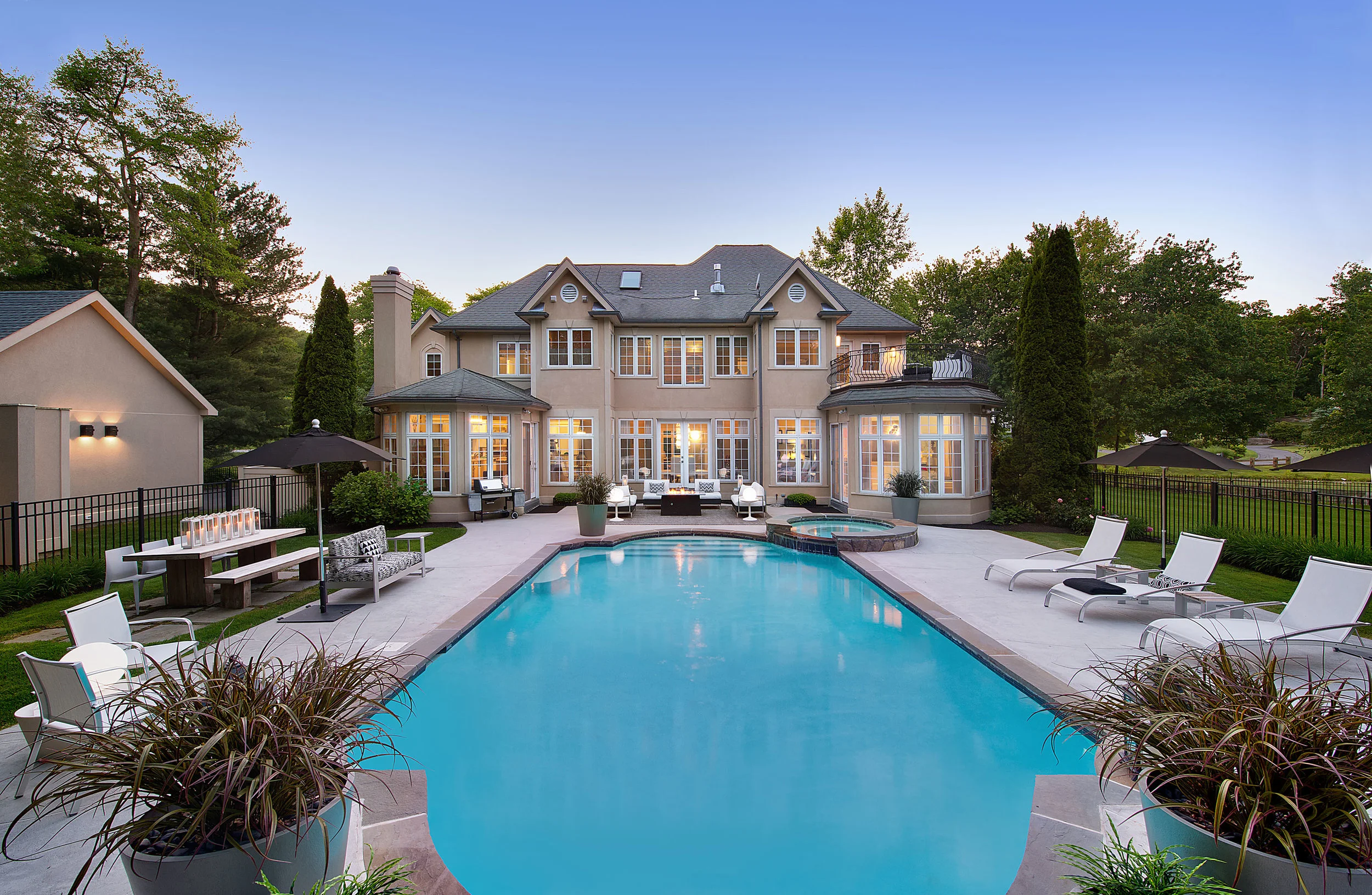 The back of the house all came together… at night it looks like a beautiful resort.