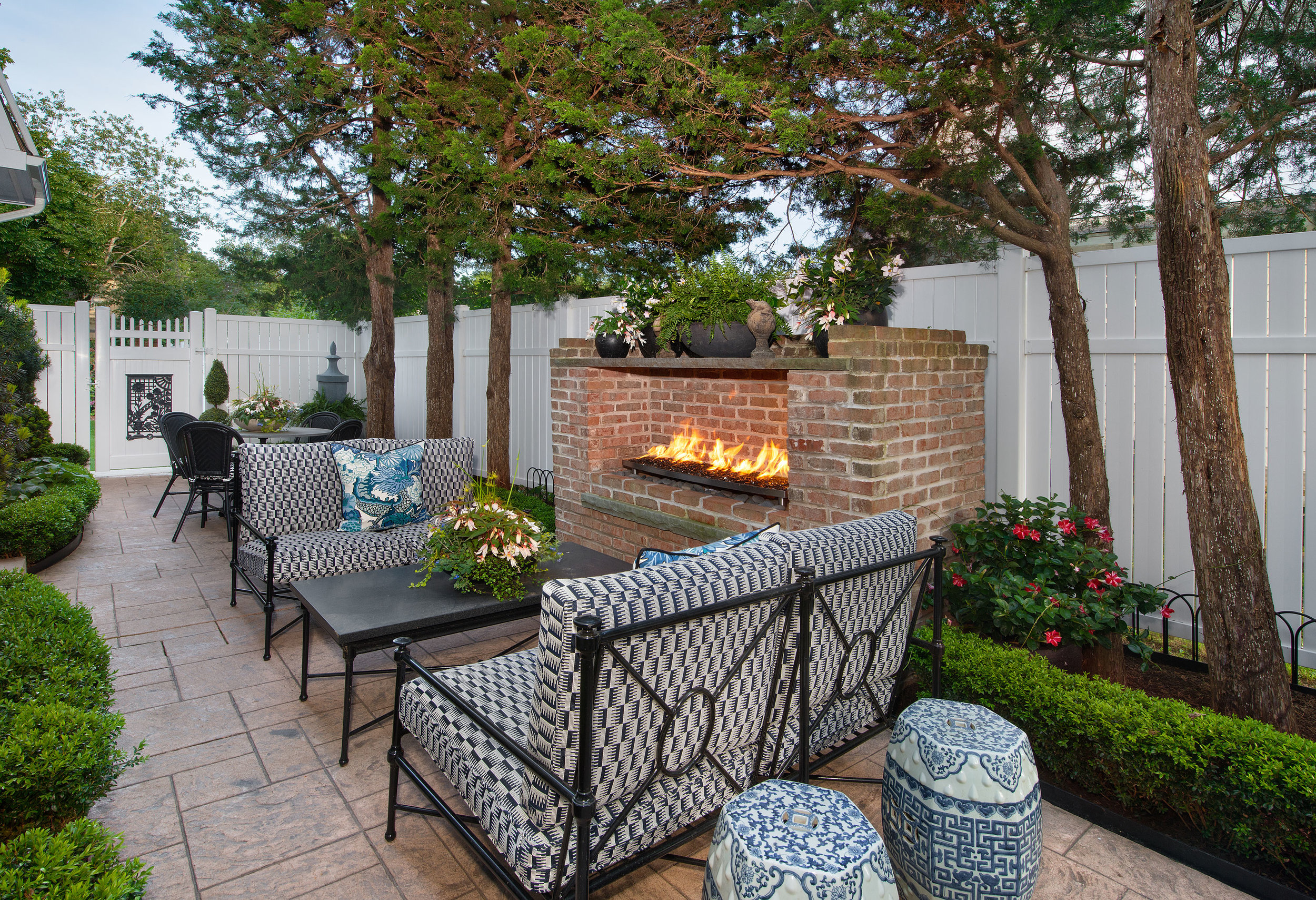 In addressing the outside, the courtyard was designed as an extension of the inside where the blue and white palette continues. The patio is a compact gathering area, but with careful planning we were able to create a comfortable gathering space and dining area.