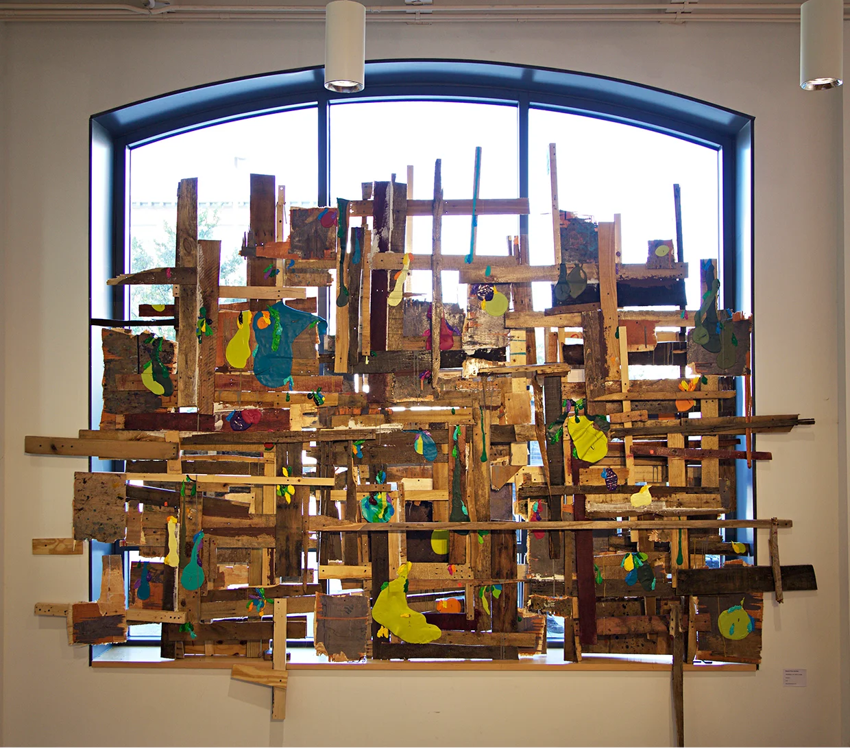 PROMESA (H.R.5278, S.2328) (2016) Found wood, acrylic, enamel, silicon, screws, glue, concrete, color lights and varnish. 122" x 133" x 12"