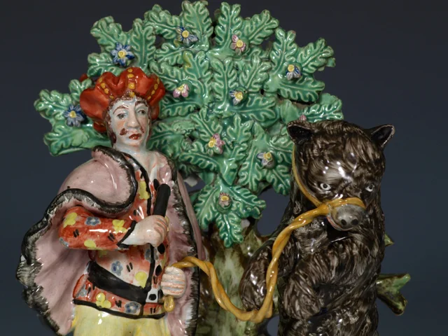 Staffordshire Pearlware Group of a Savoyard and Dancing Bear, c.1820, 8½“.