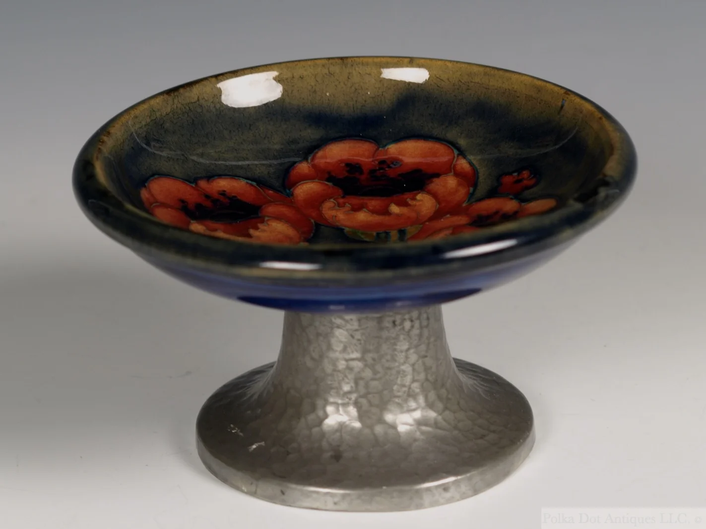 Moorcroft Liberty Tudric ‘Poppies’ Tazza, 1913, 4½" diam, 2½“ high.