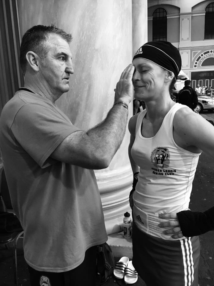 Coach Tony Burt preps Calli Bushell for a fight.