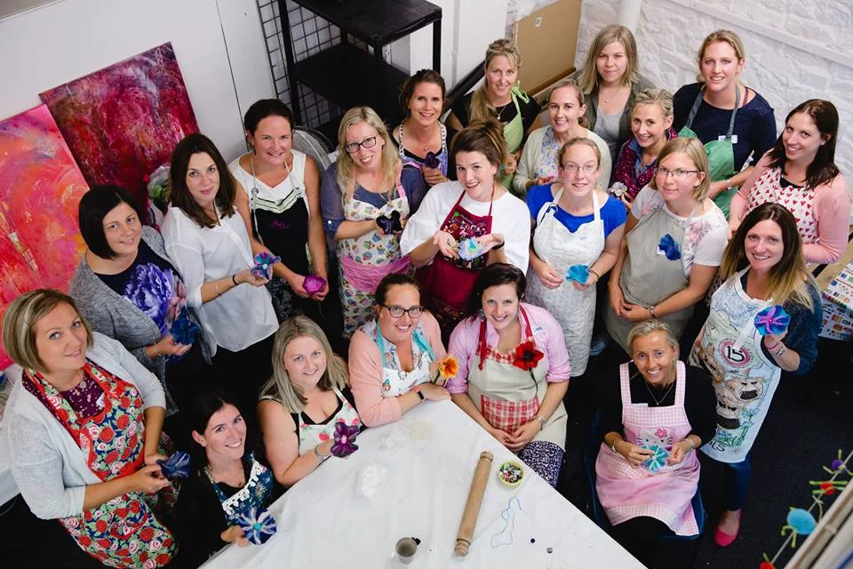 Vicky O'Neil (centre) in the Mum Space she has created