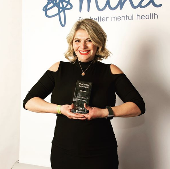 Receiving a Mind Media Award for her work in raising awareness of mental health issues