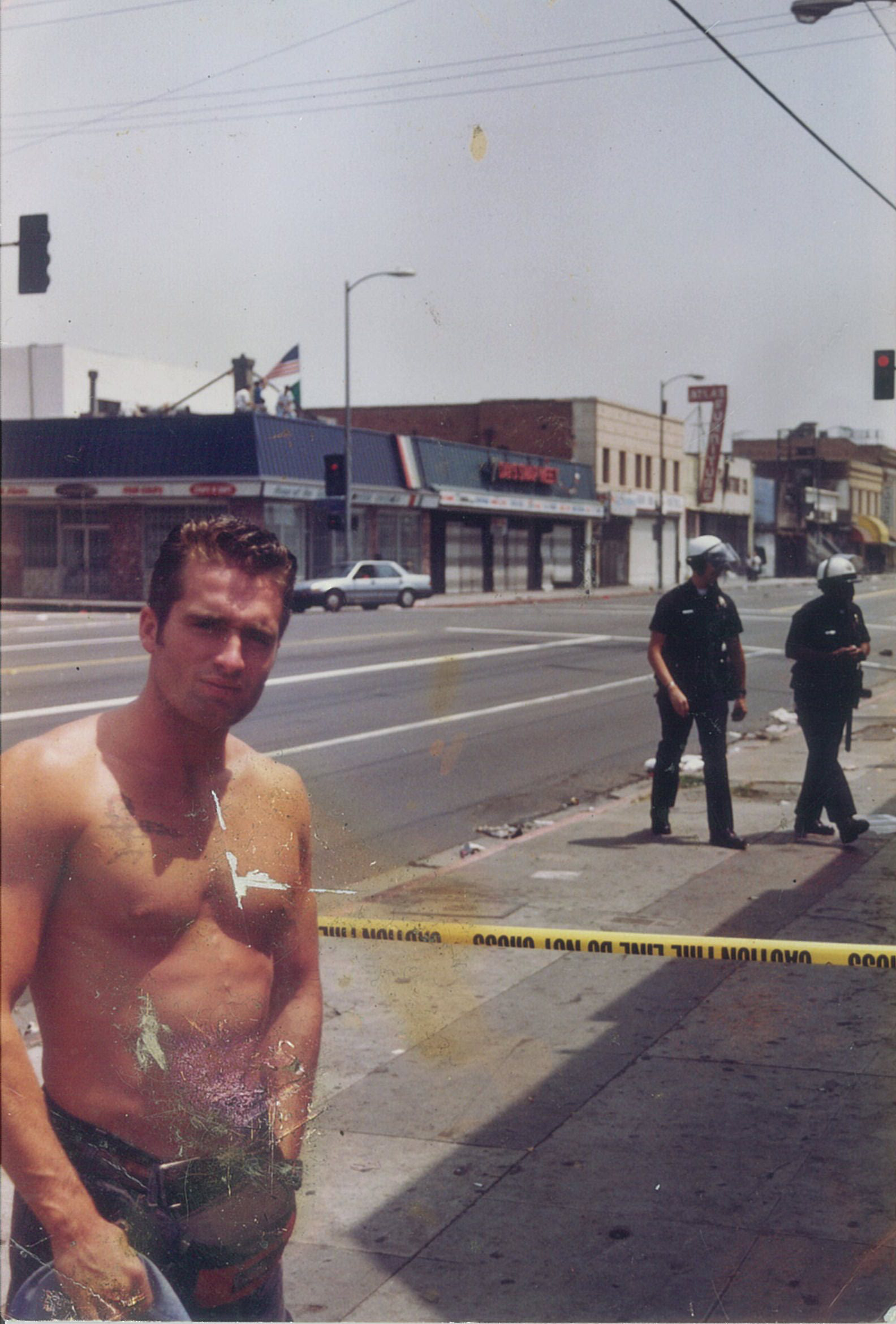 36 Jerry with cops in the back.jpg